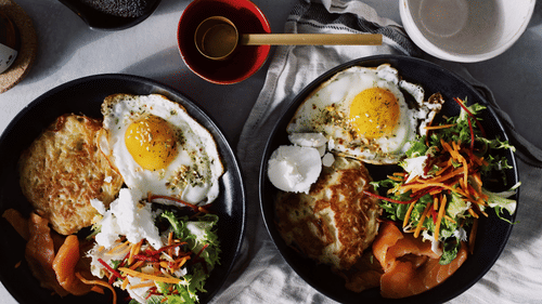 two breakfast dishes as seen from above 
