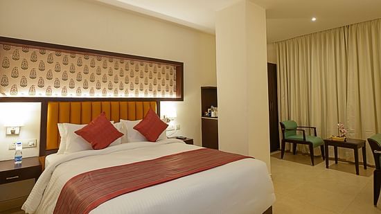 Deluxe room at Grand Continent, Secunderabad with a king size bed