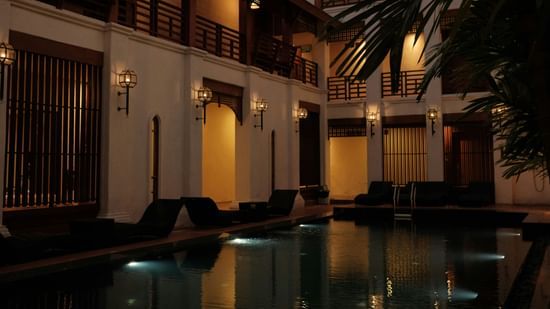 The pool at our hotel seen during an evening featuring elegant architecture and a calm ambience