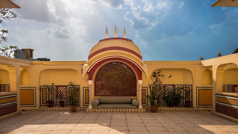 seating arrangement under a canopy with a large open space in front of it - Mandawa Haveli, Jaipur