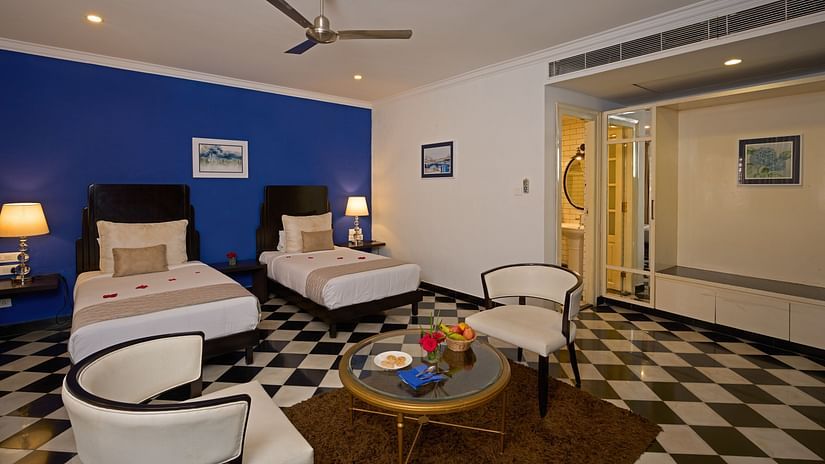 image of heritage classic rooms with twin beds at the old court house by abad, fort kochi