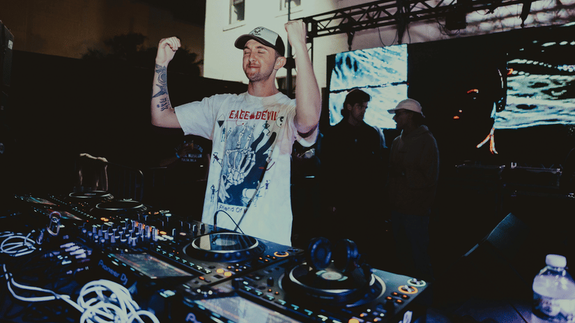 A DJ Playing at an EDM event