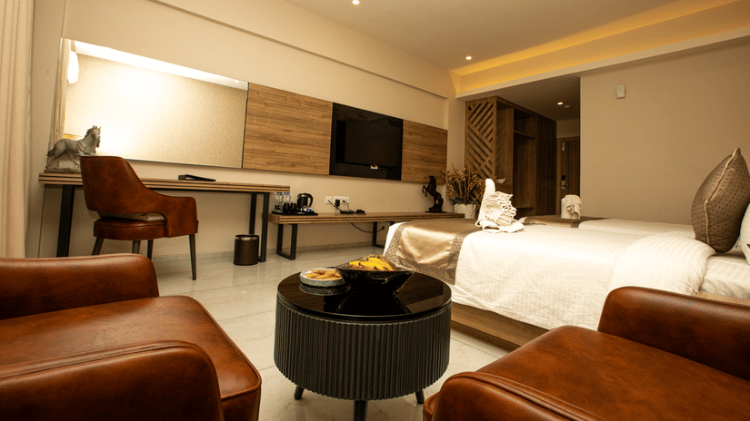 The interior of the well furnished  room with a king bed