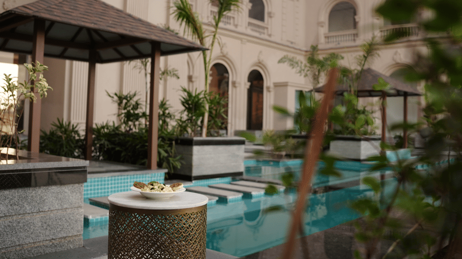 sitting area near the swimming pool at Classic Sapphire by Ananta