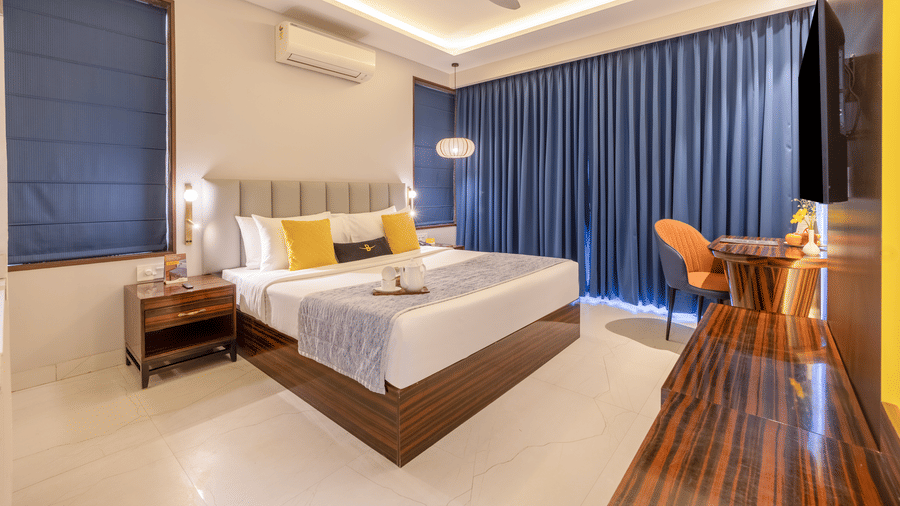 Room interior with coordinated colours, warm lighting, and modern furnishings creating a clean and elegant atmosphere - Hotel Bawa, Gurgaon