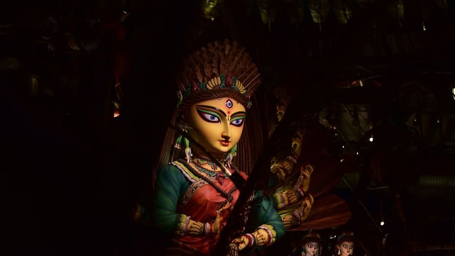 an idol of goddess durga captured with a shadowy background