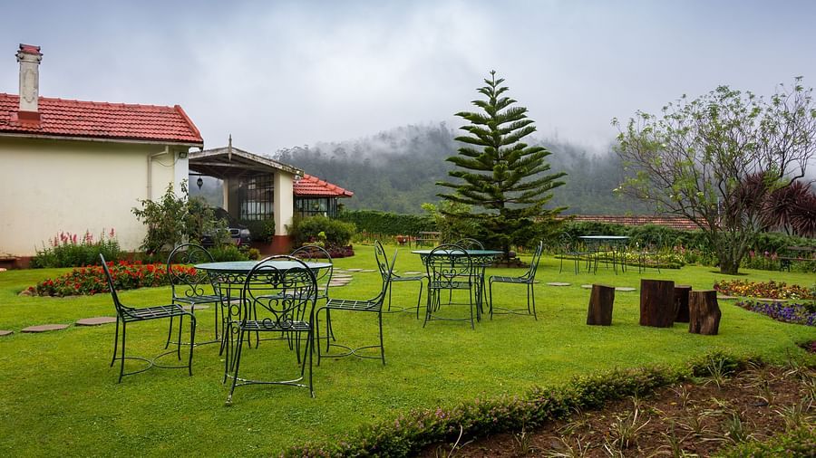 Seating area in the lawn of Sherlock, our hotel in Ooty 2