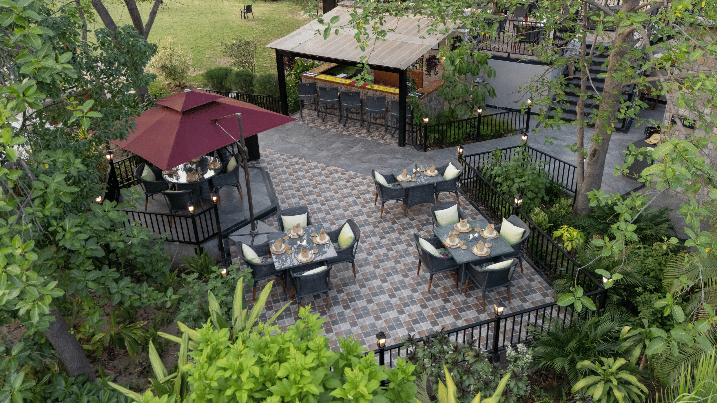 Jungle grill restaurant with flexible seating layout at The Golden Tusk, Jim Corbett