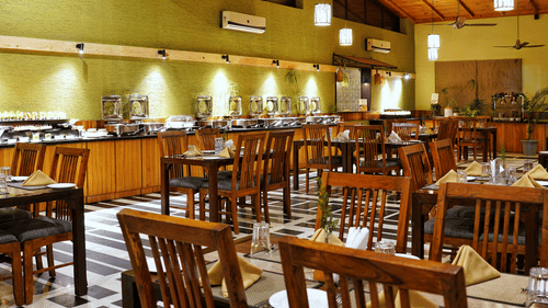 Tables and chairs in Golden Forest- The Golden tusk