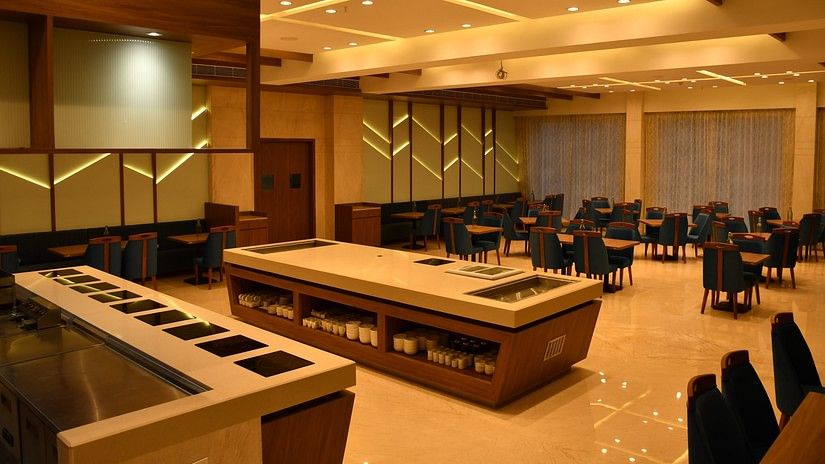 Seating arrangements inside boulevard - The Orchid Hotel, Jamnagar