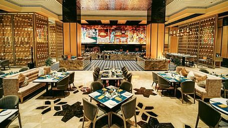 A close-up shot of the restaurant with beautifully arranged tables, showcasing its stylish ambience
