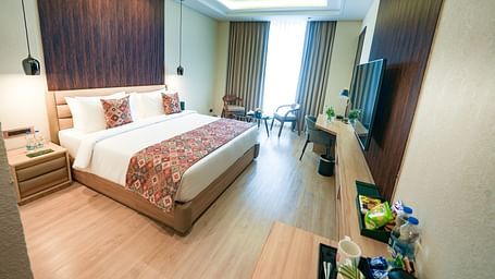 An image of Superior Temple View Room with a queen size bed and modern amenities - NAMAMI BY ZENQ BANKHANDI
