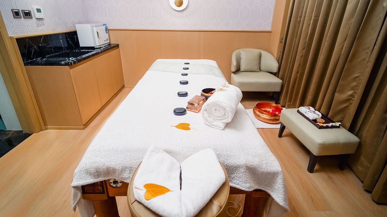 A treatment room at our spa in Madurai with comfortable seating arrangement for the guest - Grand Madurai by GRT Hotelss