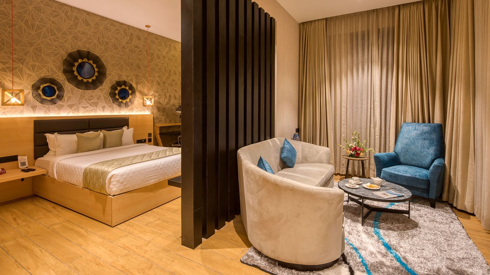 Double bed and the living area in the Sumo Suite at Le Foliage by TGI, Bangalore