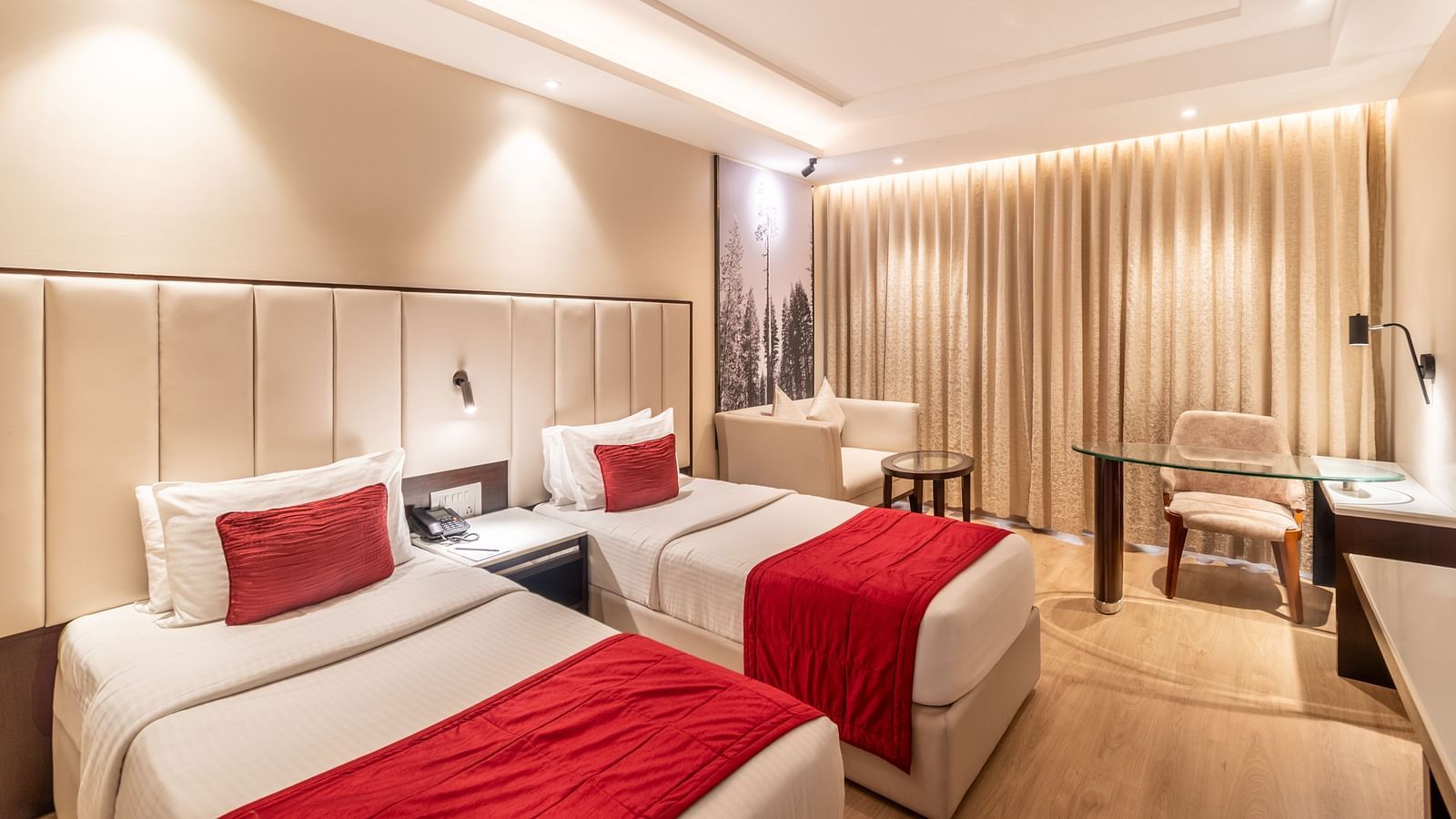 Superior Room with two beds featuring patterned bedding and overhead lighting- TGI Grand Fortuna, Krishnagiri Main Road, Hosur
