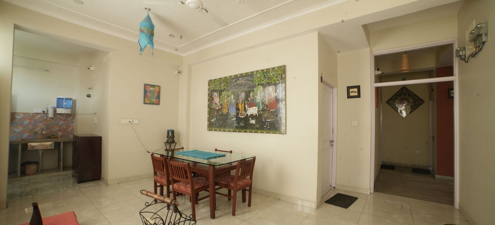 Exterior view of the homestay building showing balconies, windows, and gated entrance at Jaypore360 Homestay in Jaipur.