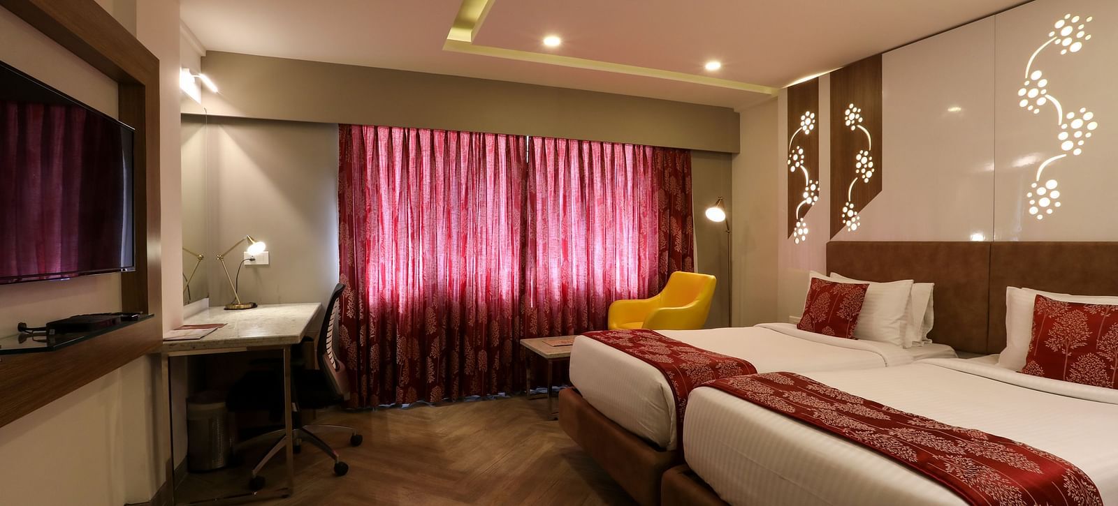A bedroom with two single beds and a workdesk and chair - Mango Hill Central, Chennai
