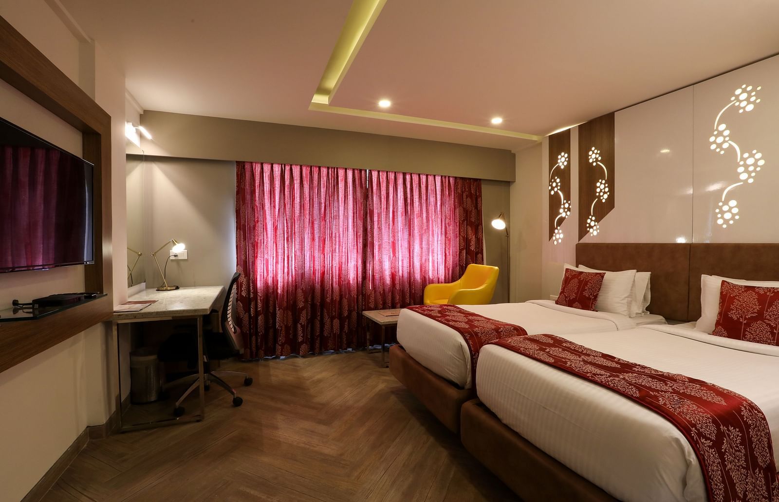 A bedroom with two single beds and a workdesk and chair - Mango Hill Central, Chennai