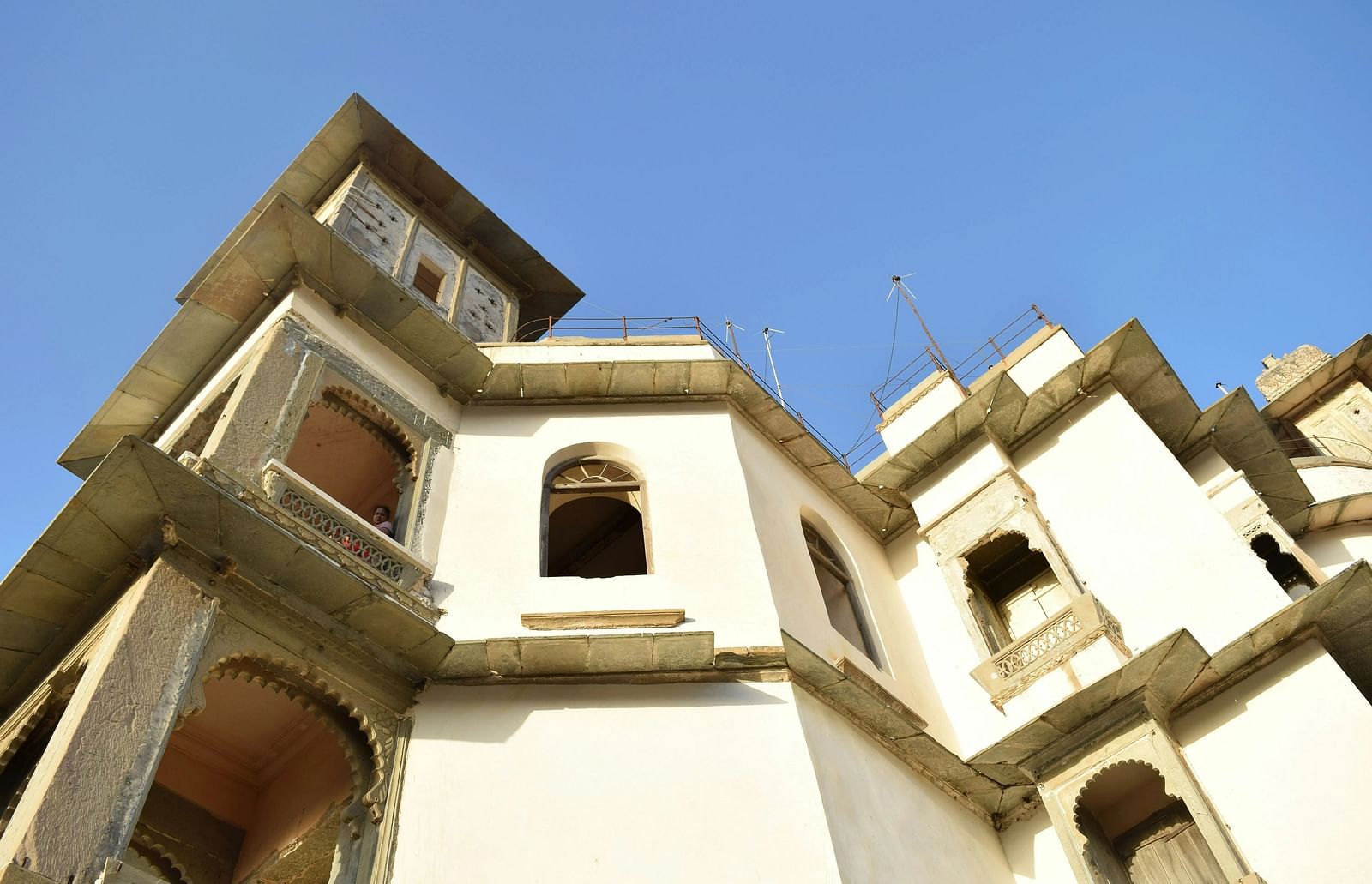 A low-angle view of a building with architectural details.