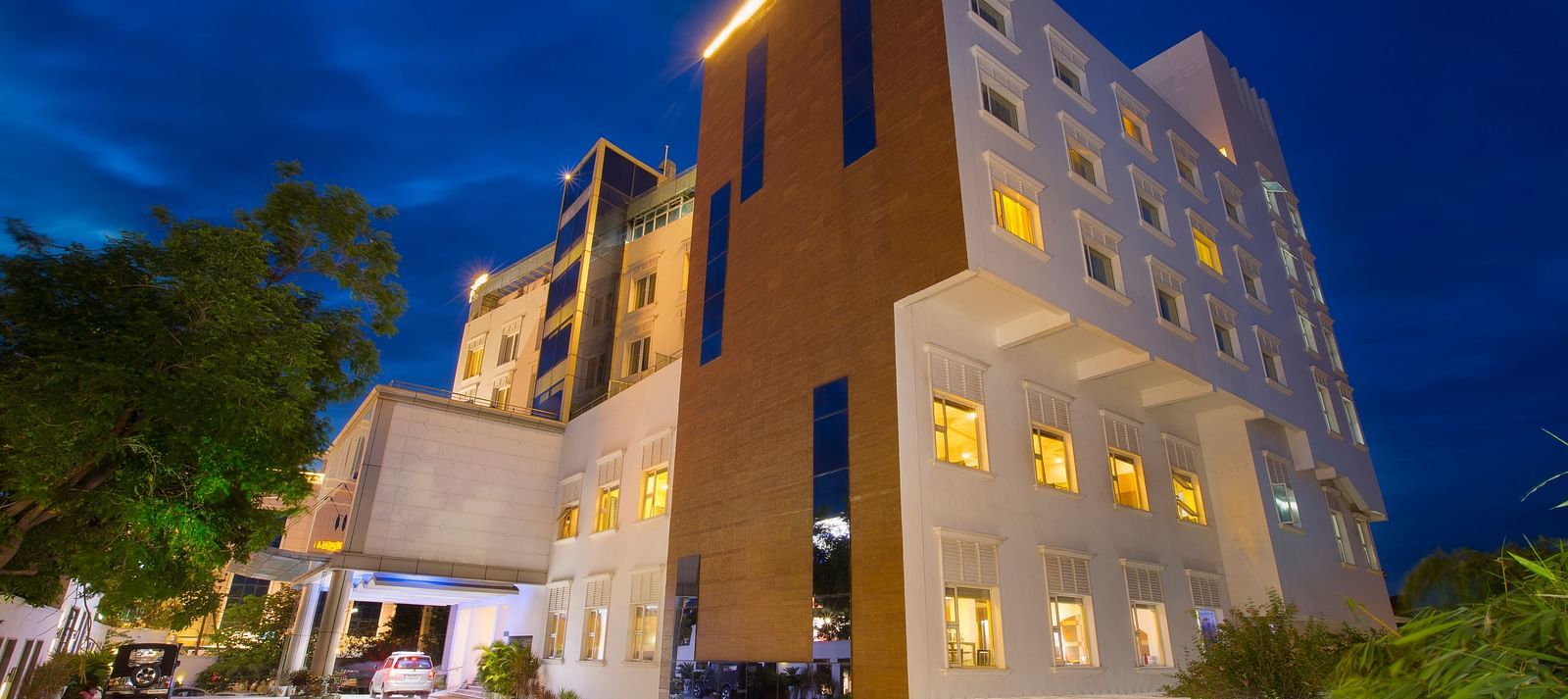 facade of Hotel Atithi - TGI Grand, Pondicherry at night