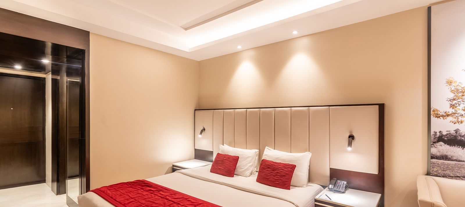Room view showing twin beds, wardrobe, and side table- TGI Grand Fortuna, Krishnagiri Main Road, Hosur