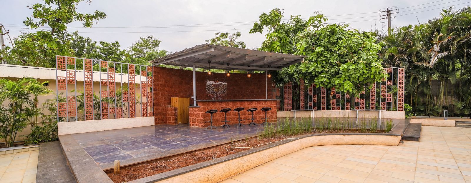 An image of outdoor seating arrangement - Trance Veechika Resort