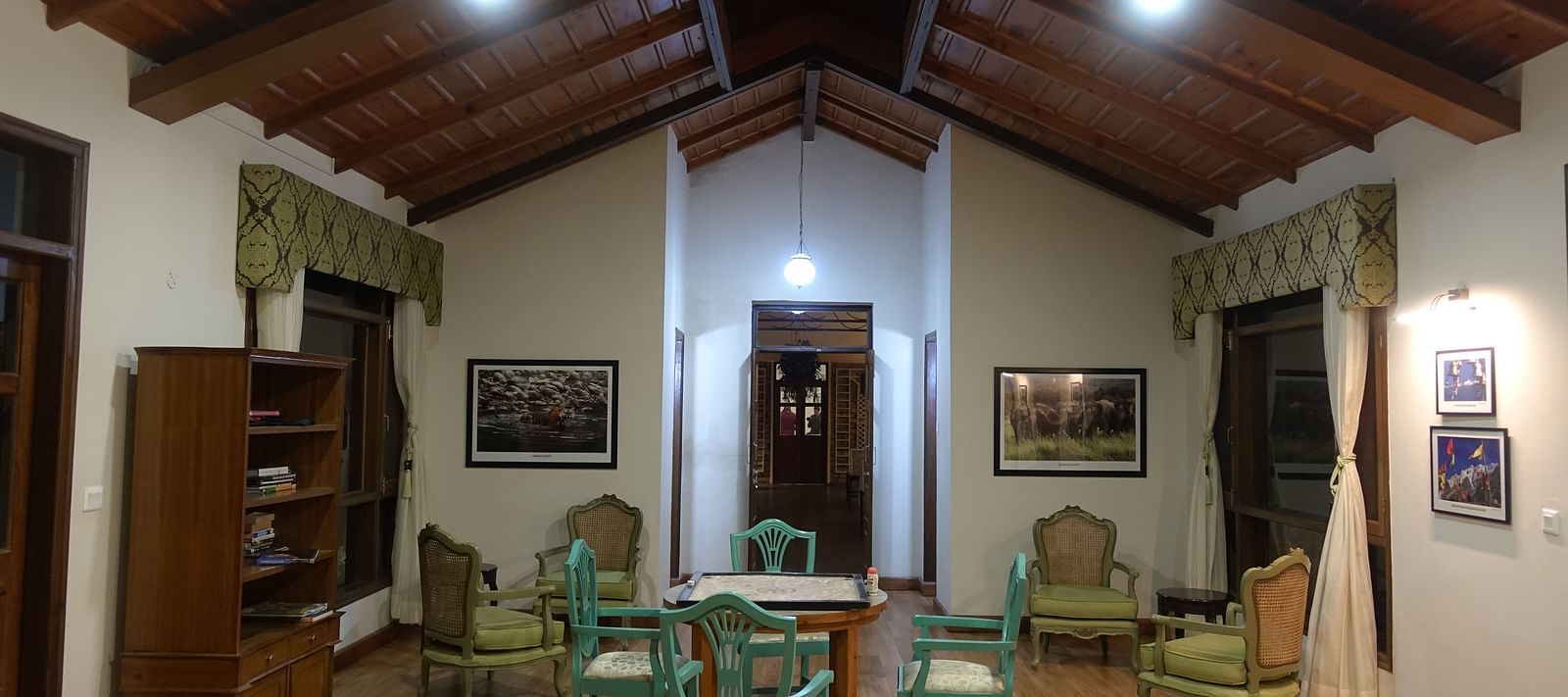 A table surrounded by chairs in our brightly-lit recreational room - BluSalzz Escapade - Anant Rasa Resort