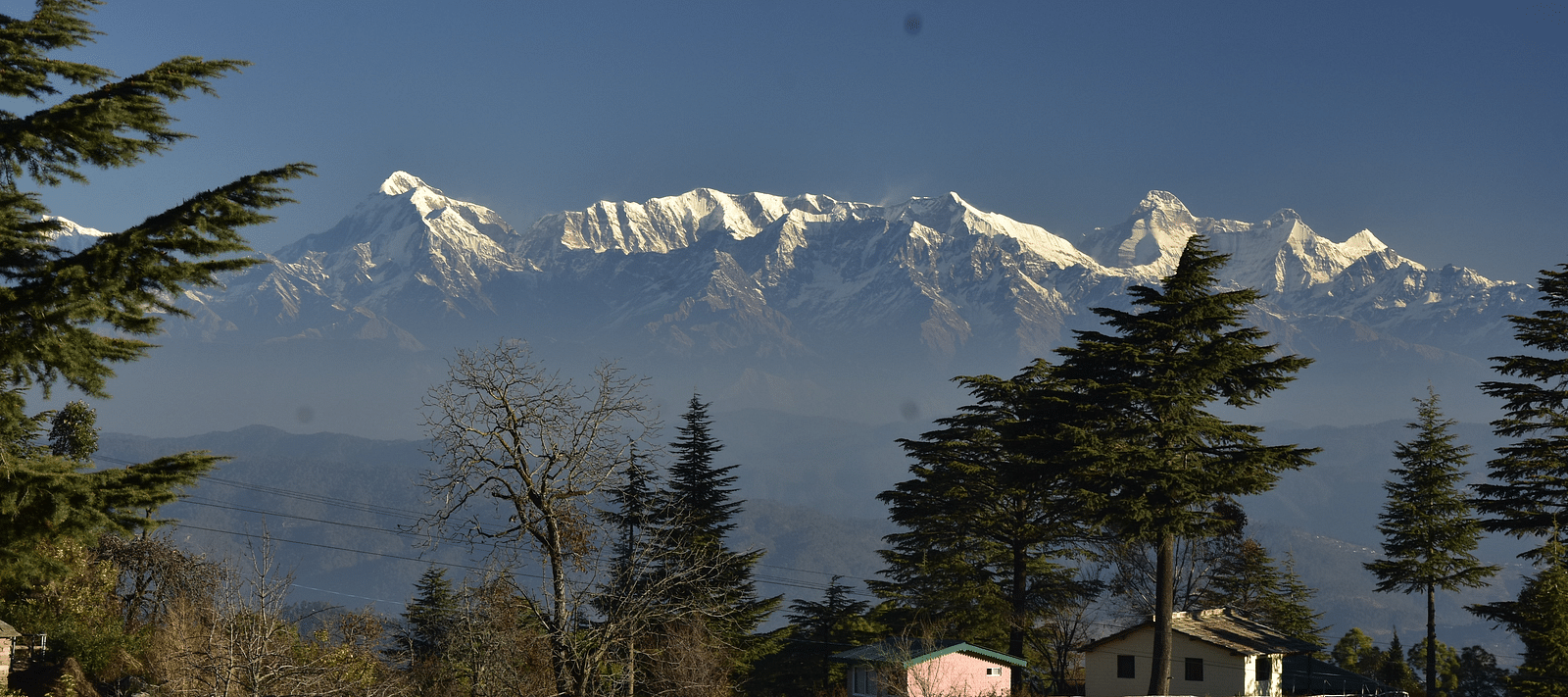 A distant view of snow-capped mountains - BluSalzz Escapade - Anant Rasa Resort