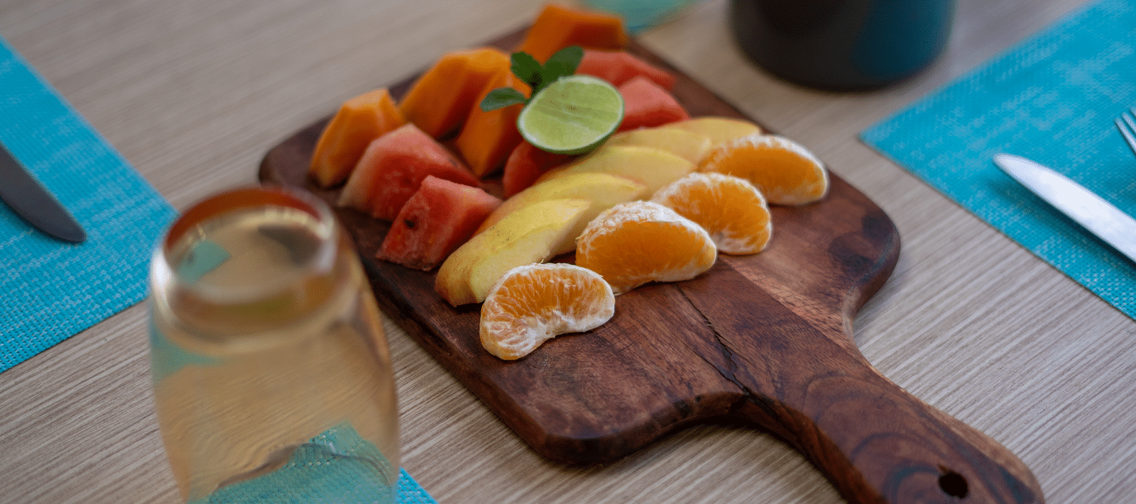 A variety of sliced fruits neatly arranged for serving at BluSalzz Escapade Resort, Lansdowne.