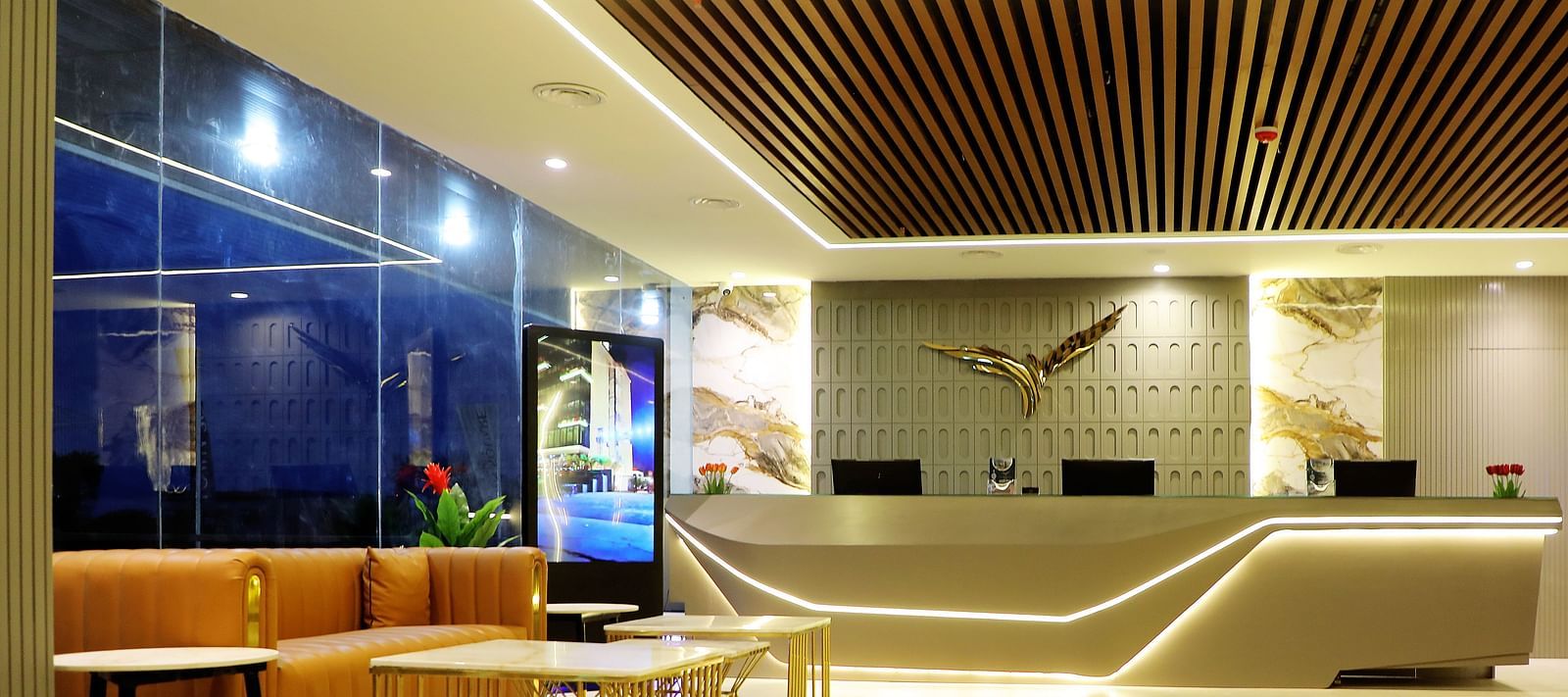 Lobby lounge at Town Square Suites with comfortable seating and sleek modern interiors