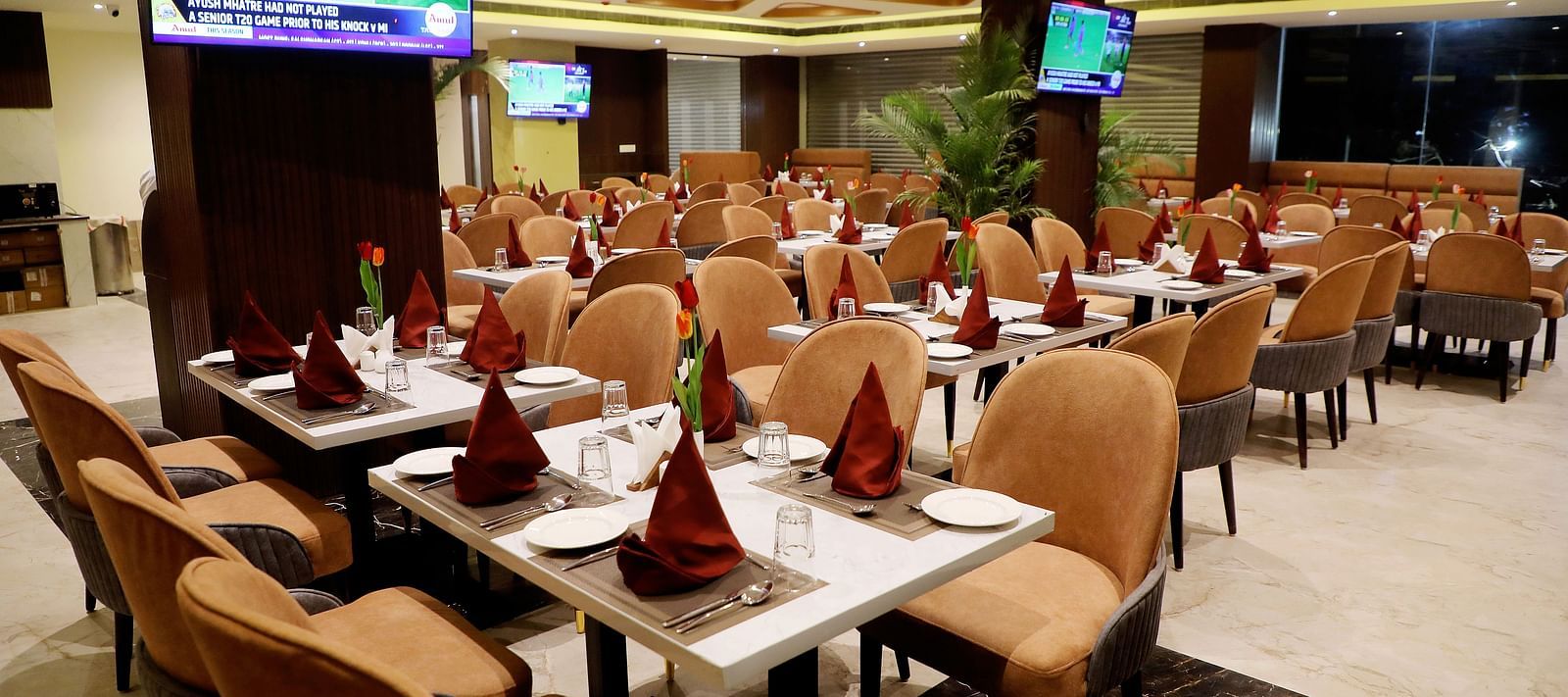 Elegant dining area at Town Square Suites restaurant with stylish seating and fine table settings