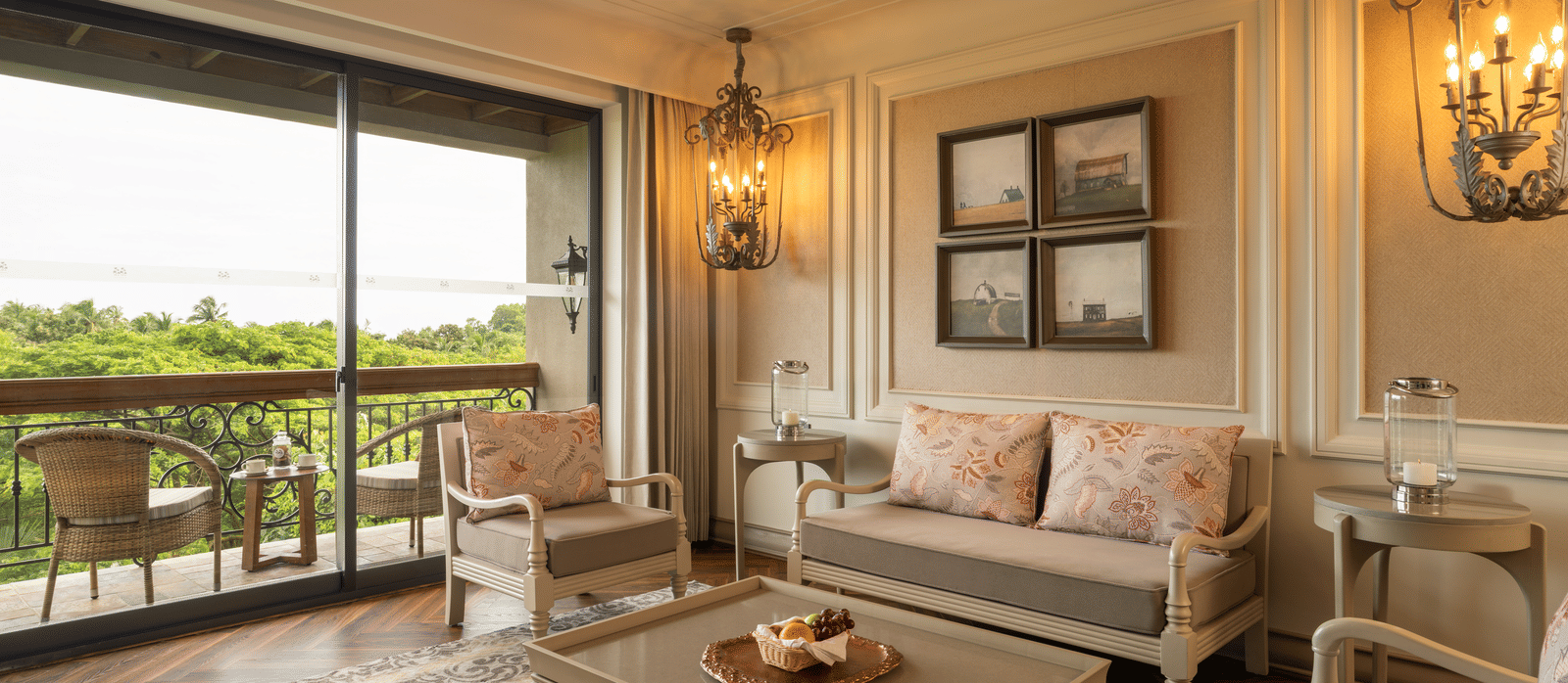 Full view of the living room of the Evren Suite with a balcony beside it at The Evren, Vagator.