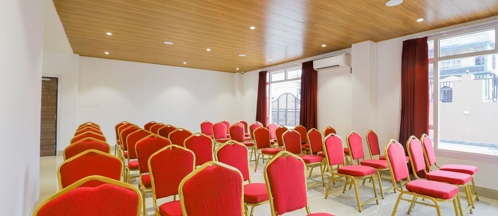 event setting with red chairs at Banari Regency by Summit, Namchi