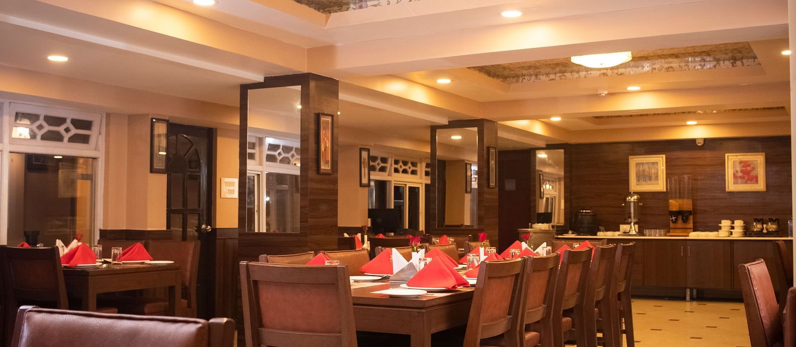 Multiple tables and chairs in a closed dining space | Summit Oakden Resort & Spa, Mall Road