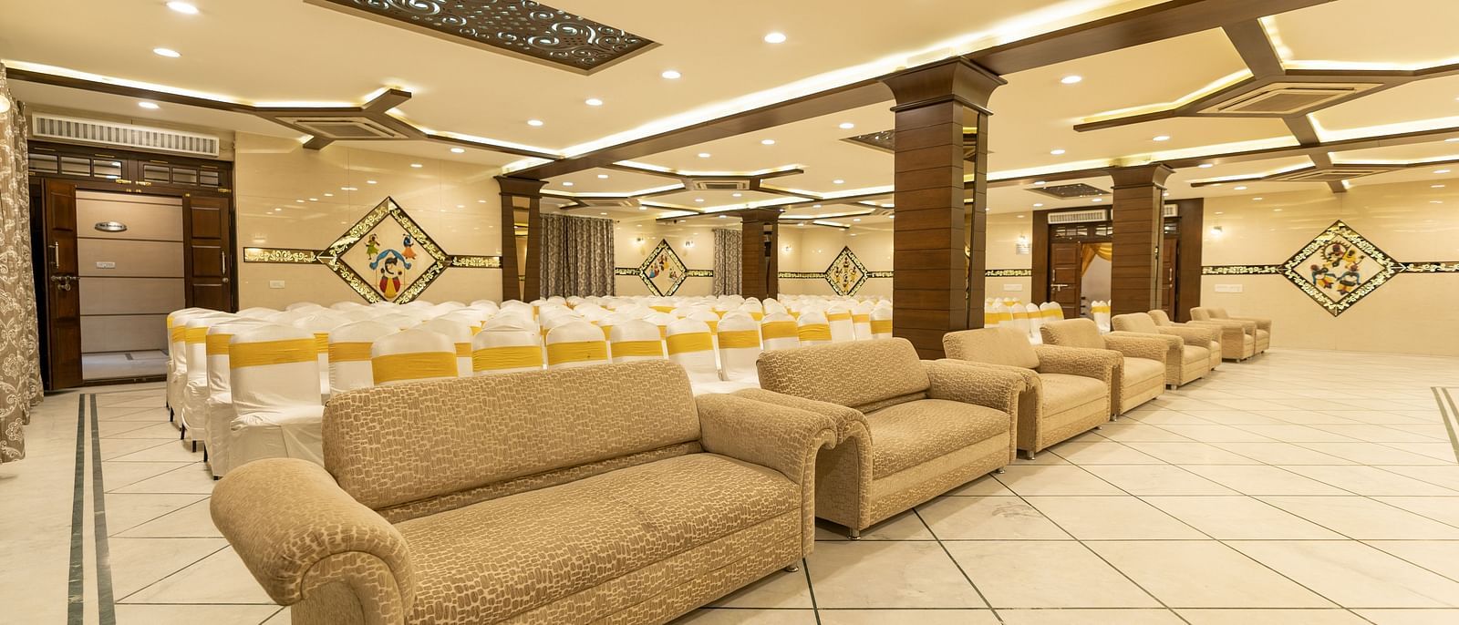 Seating arrangements inside a banquet hall - Hotel Pai Vista, KR Road