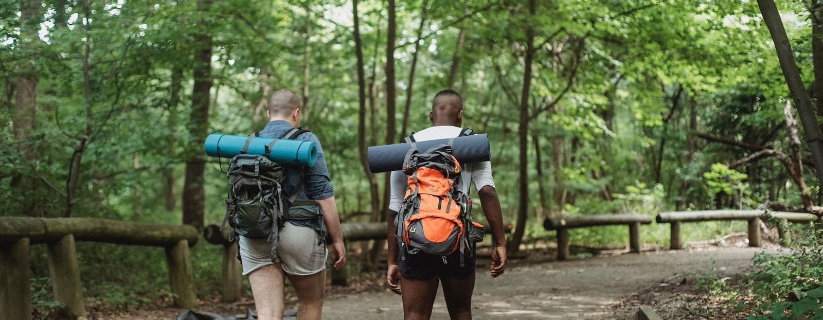 An image of two men trekking