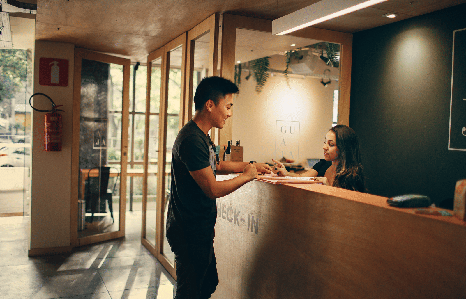 Lime Tree Hotel Golf Course Extension Road Gurgaon - A person checking themselves into a hotel