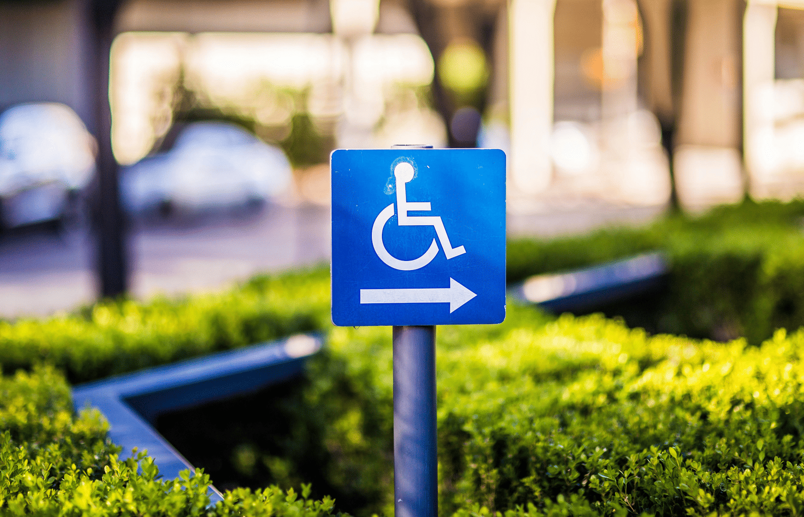 An image of a signboard with a wheelchair symbol on it
