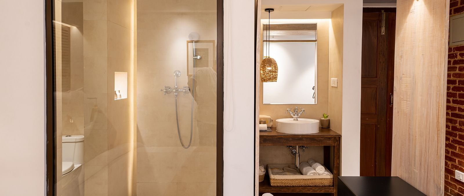 A washroom featuring the shower area and the wash area - The Nanee