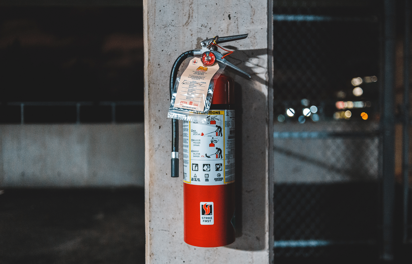 Fire Safety hanging on a pillar.
