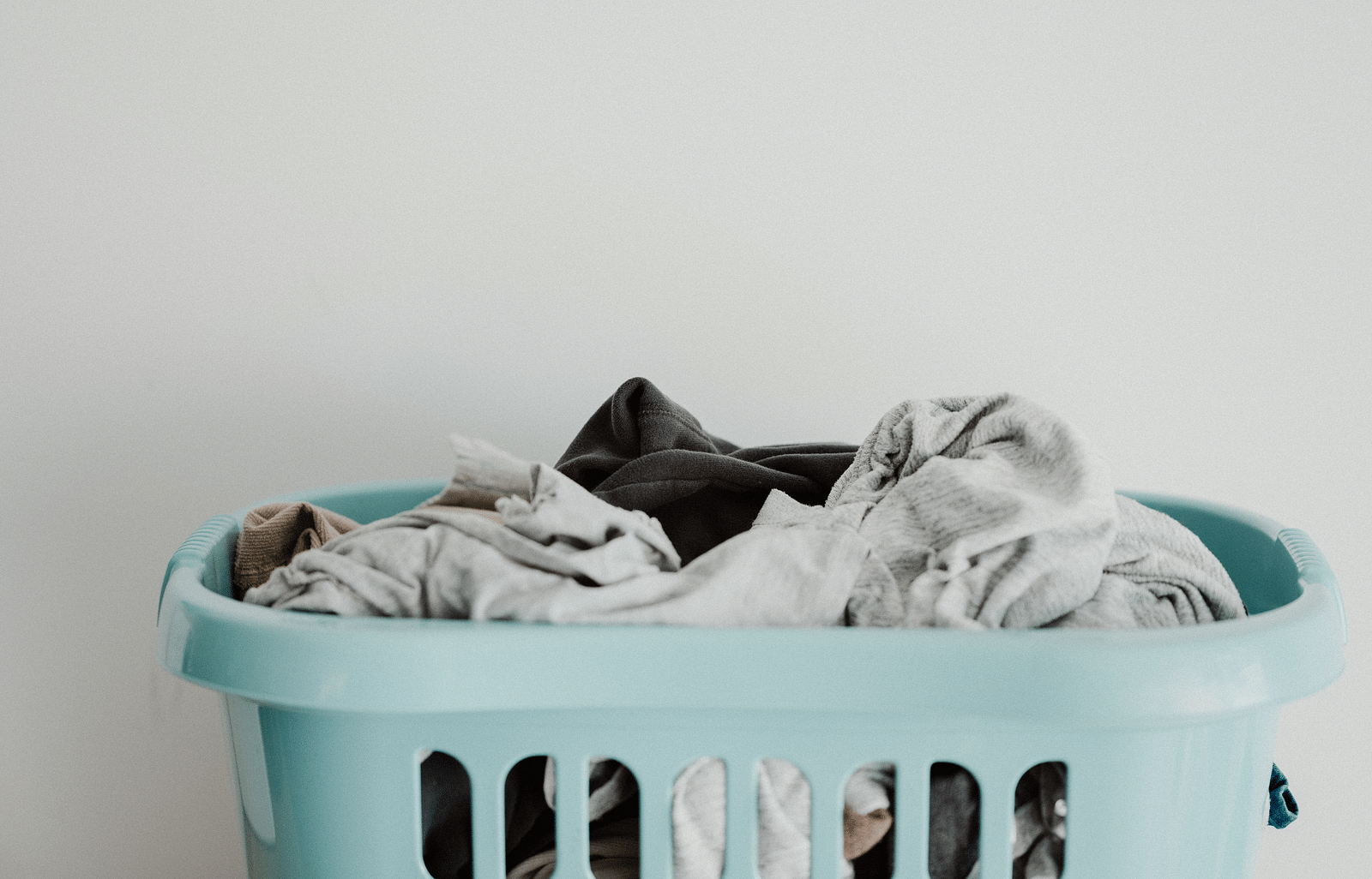 A picture of a basket full of clothes.
