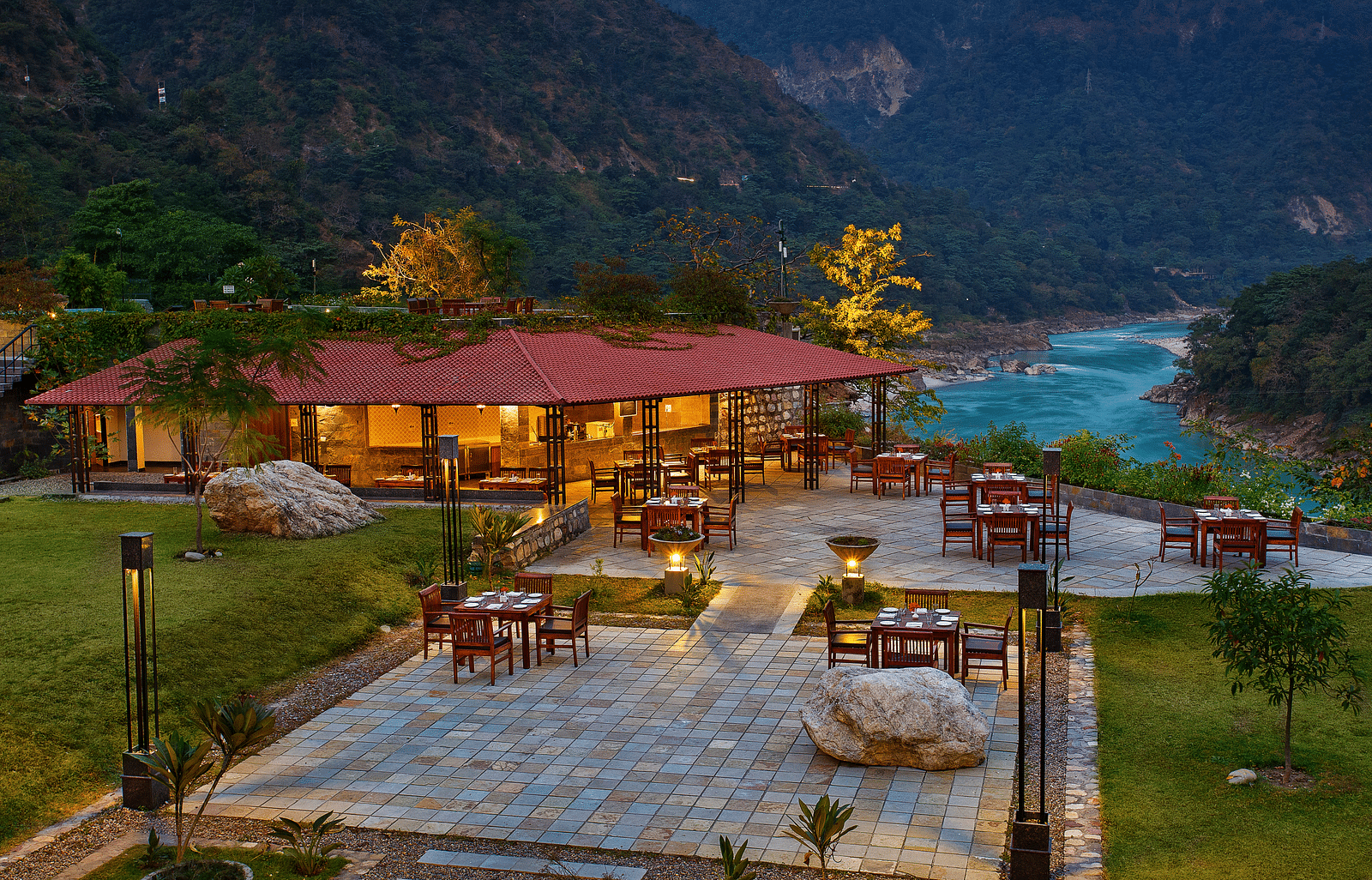 Aloha On The Ganges Rishikesh illuminated with serene ambient lighting.