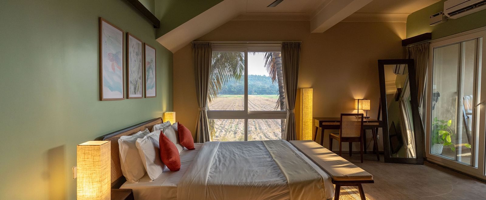 Elegant room featuring king size bed, modern furniture, and calming green interiors at Kssemya.