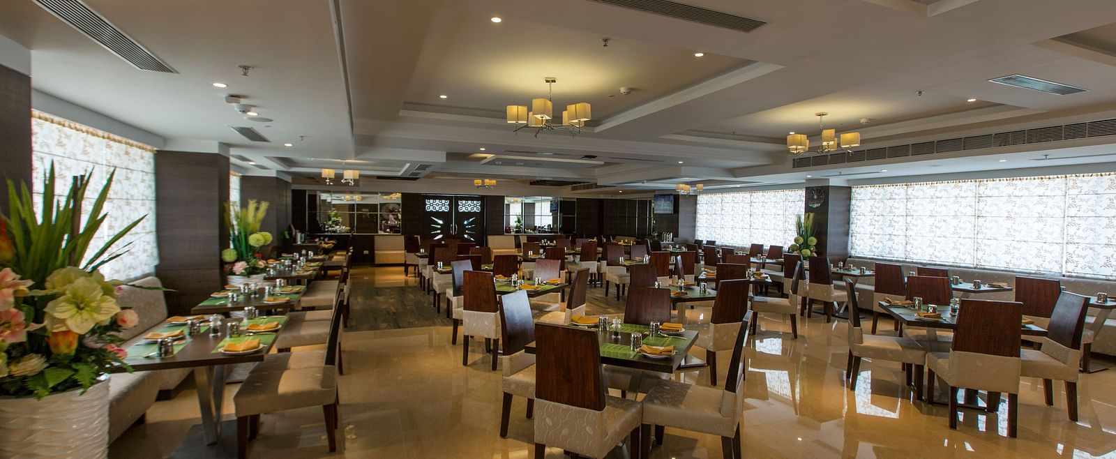 An overview of the seating arrangements inside Plaintain Leaf Restaurant Hotel Pai Viceroy Tirupathi 