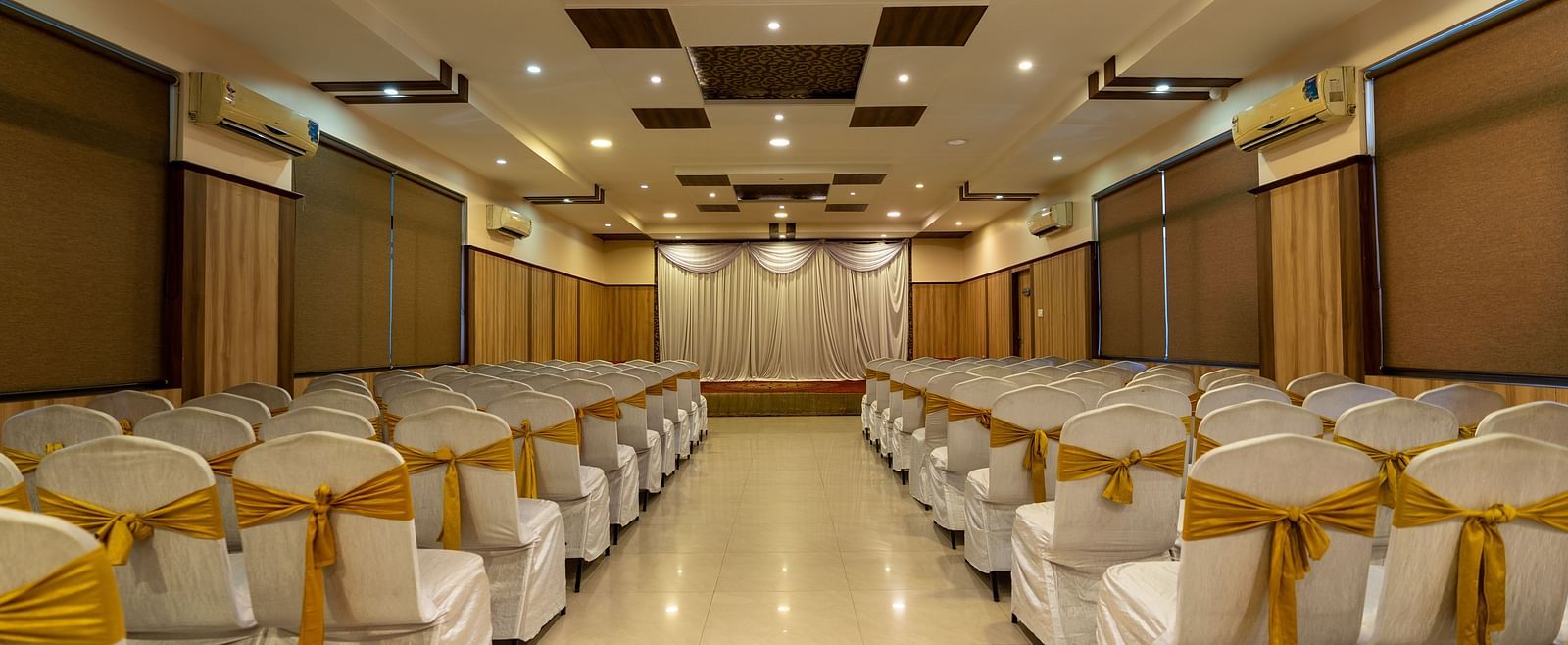 Seating arrangements inside a banquet hall - Hotel Pai Vista, KR Road
