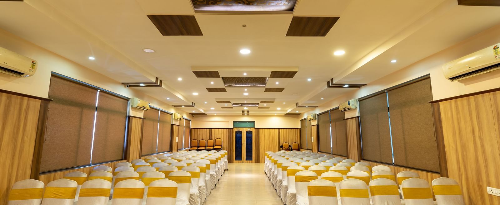 Seating arrangements inside a banquet hall - Hotel Pai Vista, KR Road