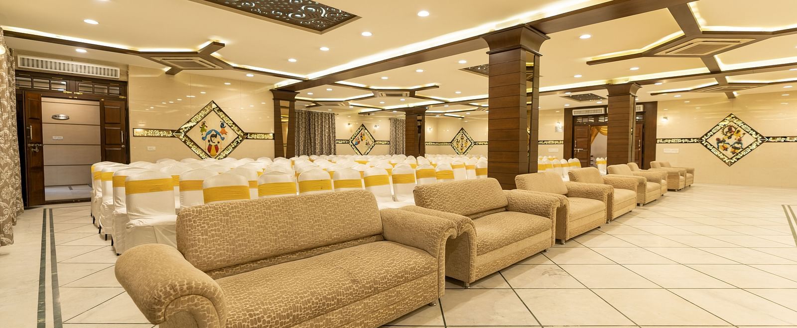 Seating arrangements inside a banquet hall - Hotel Pai Vista, KR Road