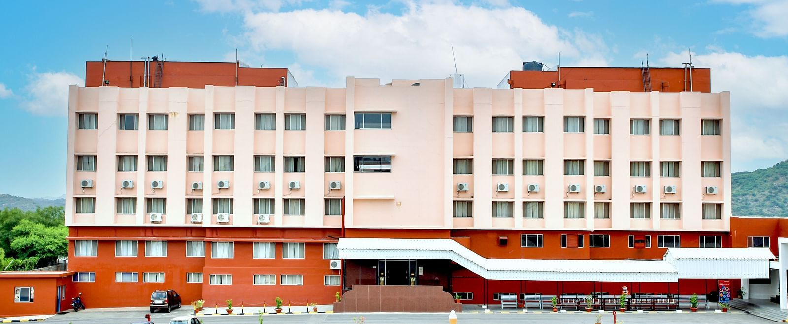 A long shot of the facade of Hotel Sahara in Ramoji Film City - Hotel Exterior in Hyderabad.