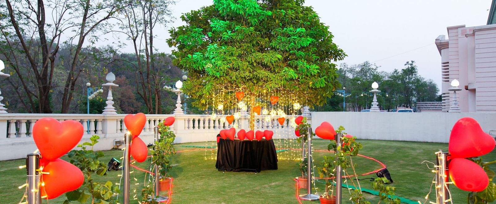 A lawn decorated in a valentine theme during daytime