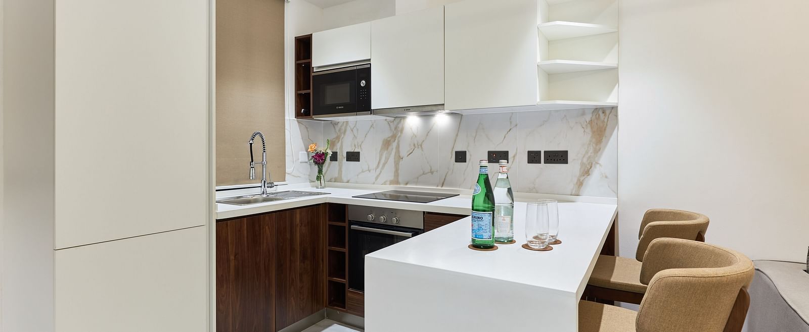 A well-equipped kitchen area in Junior Suite at The Pelican Hotel, Accra.